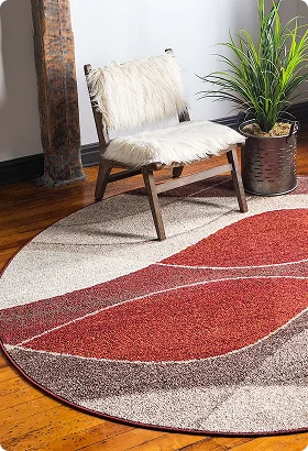 A cozy corner features a round, patterned rug
