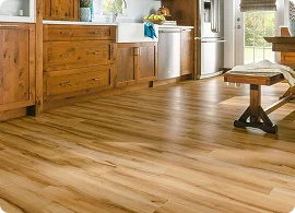 Bright kitchen featuring warm wooden cabinetry