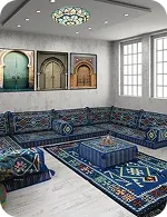 A cozy living room with ornate blue-patterned seating