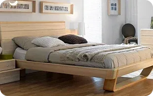 A modern wooden bed with a stylish headboard