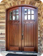 Double wooden doors with glass panes